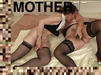 Two grandmothers play with a cock and each other