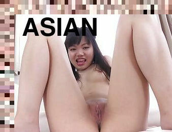 Asian delicious shaved teen spreads her pussy wide open