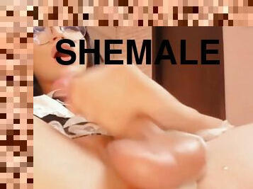Nerdy Shemale Jerks Off Her Cock