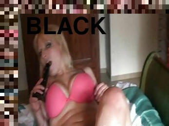 Black vibrating dildo in her pussy