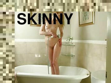 Perfect young body looks breathtaking in the shower