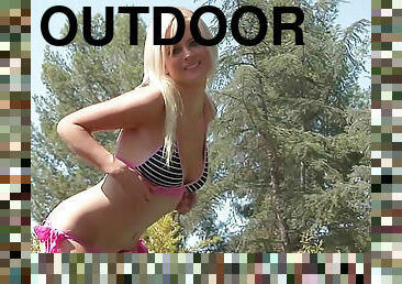 Outdoors with blonde in bikini