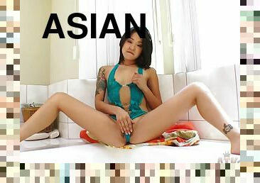 Asian babe with a hairy cunt teases on the casting