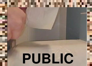 0.25 Slow-motion of public bathroom cum into sink.