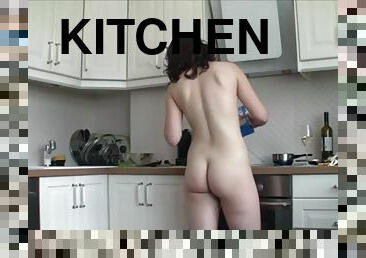 Naked in kitchen