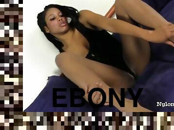 Ebony chick playing with pussy