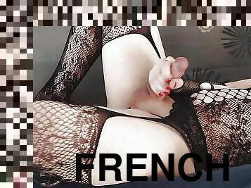 The pretty French crossdresser plays with her clit