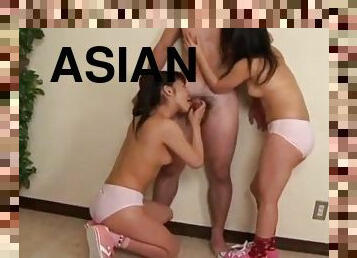Asian babes give a hot blowjob