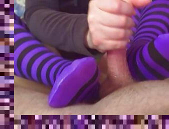 Jerking cock with my wet stockings until he cum