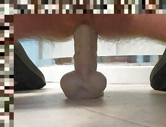 Masturbating with a dildo