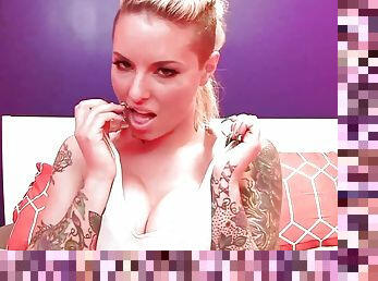 Curvy tattooed starlet Christy uses a toy on her tight pussy