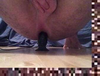 Riding big thrusting dildo and cumin