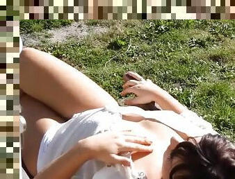 Spying on a sexy British girl stripping in the garden