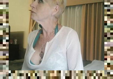 Horny granny Carla loves to show herself