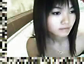 Adorable Asian teen on webcam