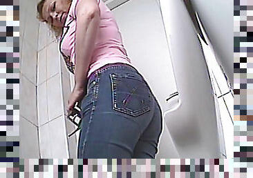 Blonde with curly hair takes a piss