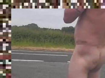 Jerking off naked at roadside