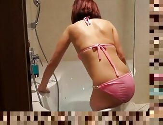 DAK amputee woman taking a bath at home