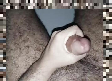 Masturbating and massaging a big cock