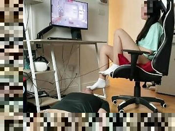 Mistress in white socks playing PC games . Locked in chastity boyfriend worshipping socks and feet