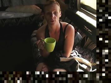 Mature blonde finishes her tea and gets naked