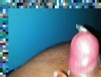 Handjob and cum inside the condom