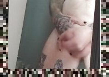 Hot tattooed stud cums on a mirror