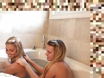 Tiny Becky and her girlfriend share a bathtub and large dildo!