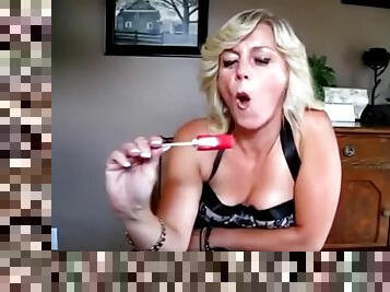 Sexy busty blonde woman milks a big cock