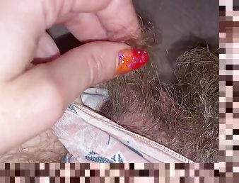 Closeup of huge clit head and hairy pussy