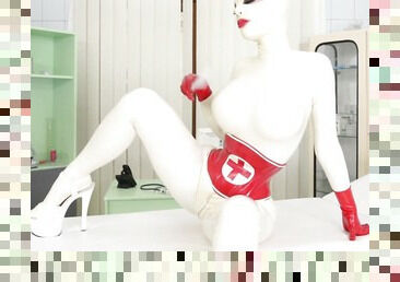 Kinky solo action on the bed by nasty Lucy Latex in nurses uniform